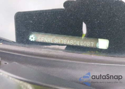 2010 Honda Odyssey Ex-L z USA, uszkodzony, nr VIN 5FNRL3H78AB044087